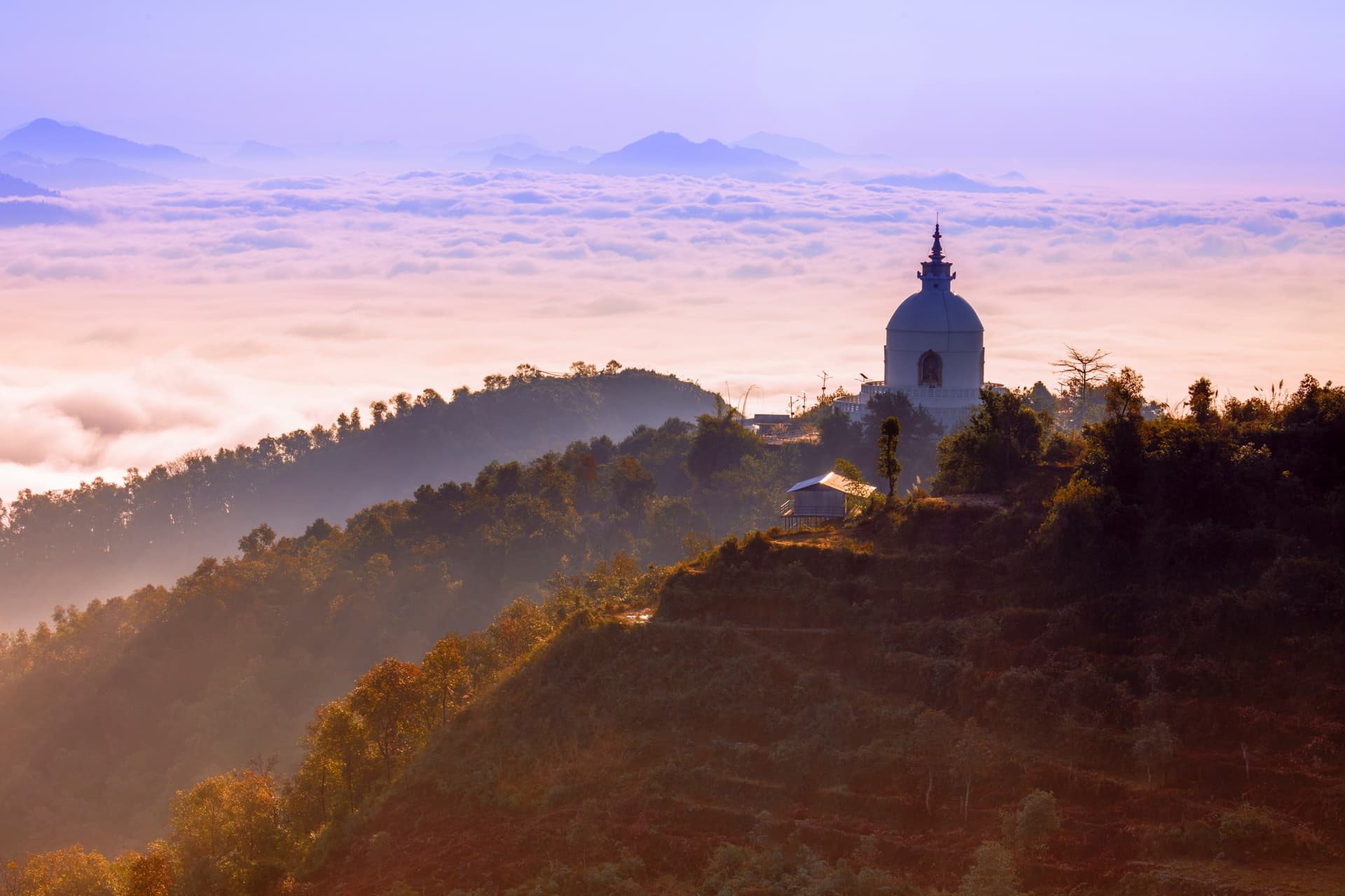 Watching the sunrise near the Peace Pagoda in Pokhara